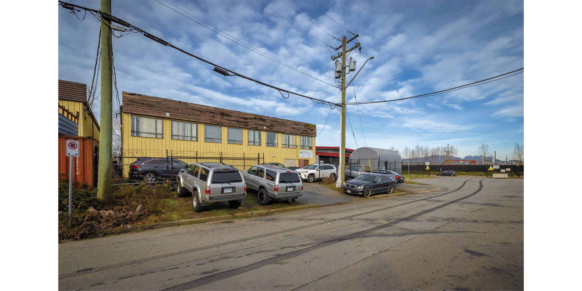 11559 132A Street building exterior showing main entrance and parking