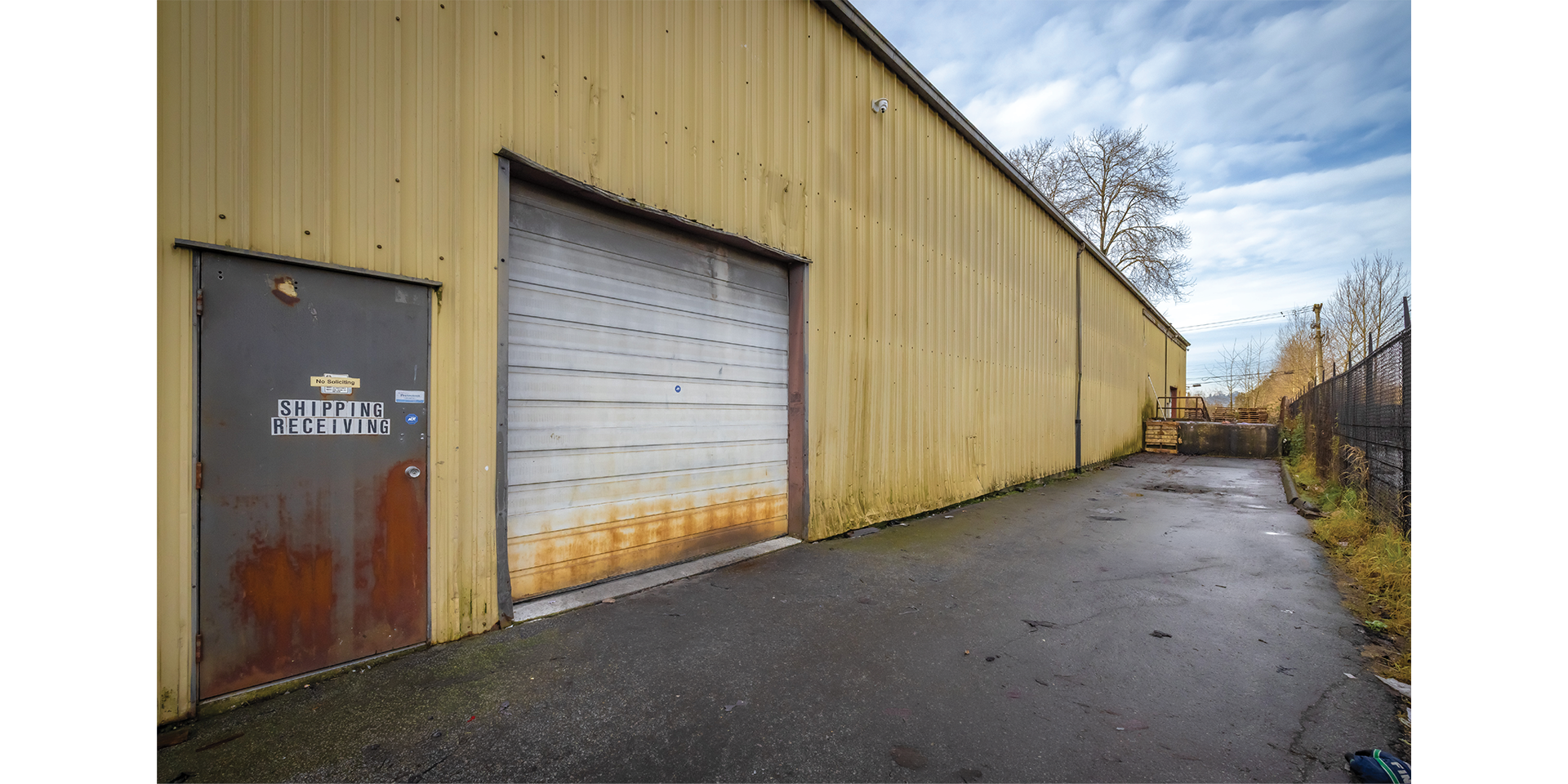 11559 132A Street building exterior showing rear loading area