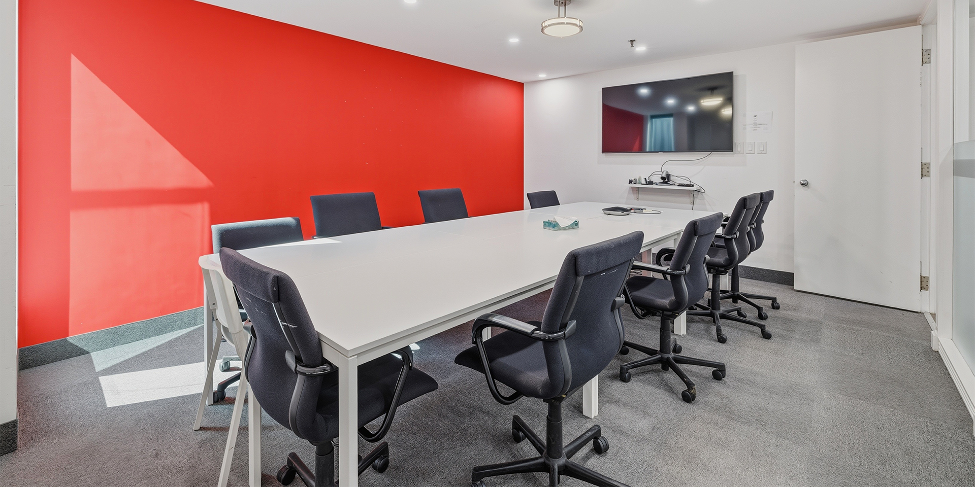 30 St Patrick Street Suite 800 Boardroom with red wall
