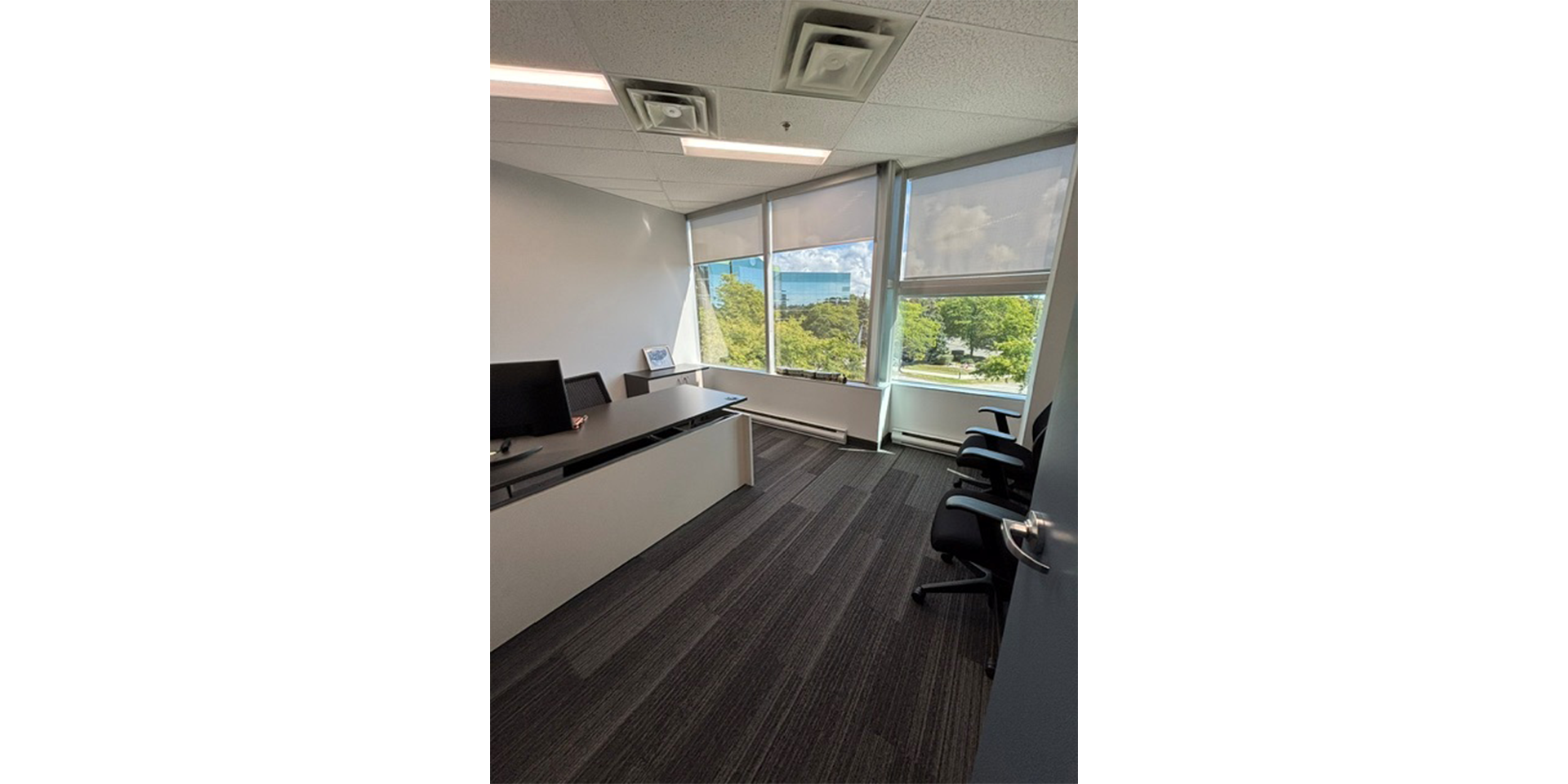 Another office with chairs and desk 320-110 Matheson Boulevard W