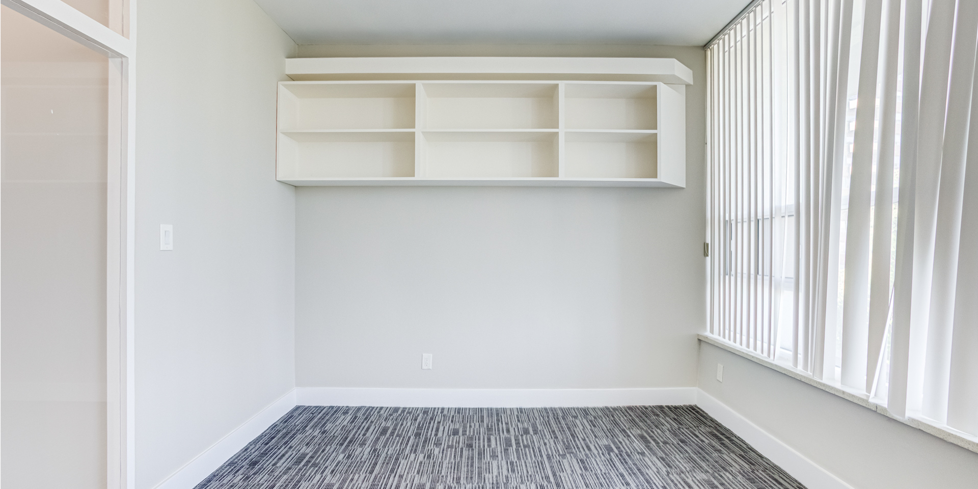 An empty room with shelvings 801-60 Pleasant Boulevard