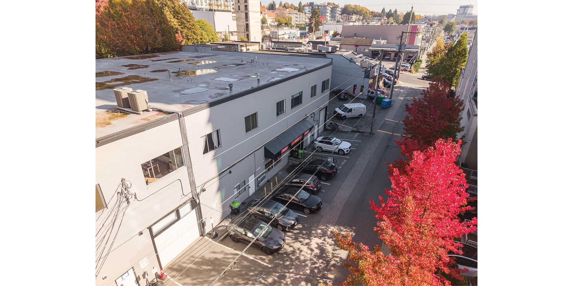 167 East 1st Street aerial of building main entrance and parking