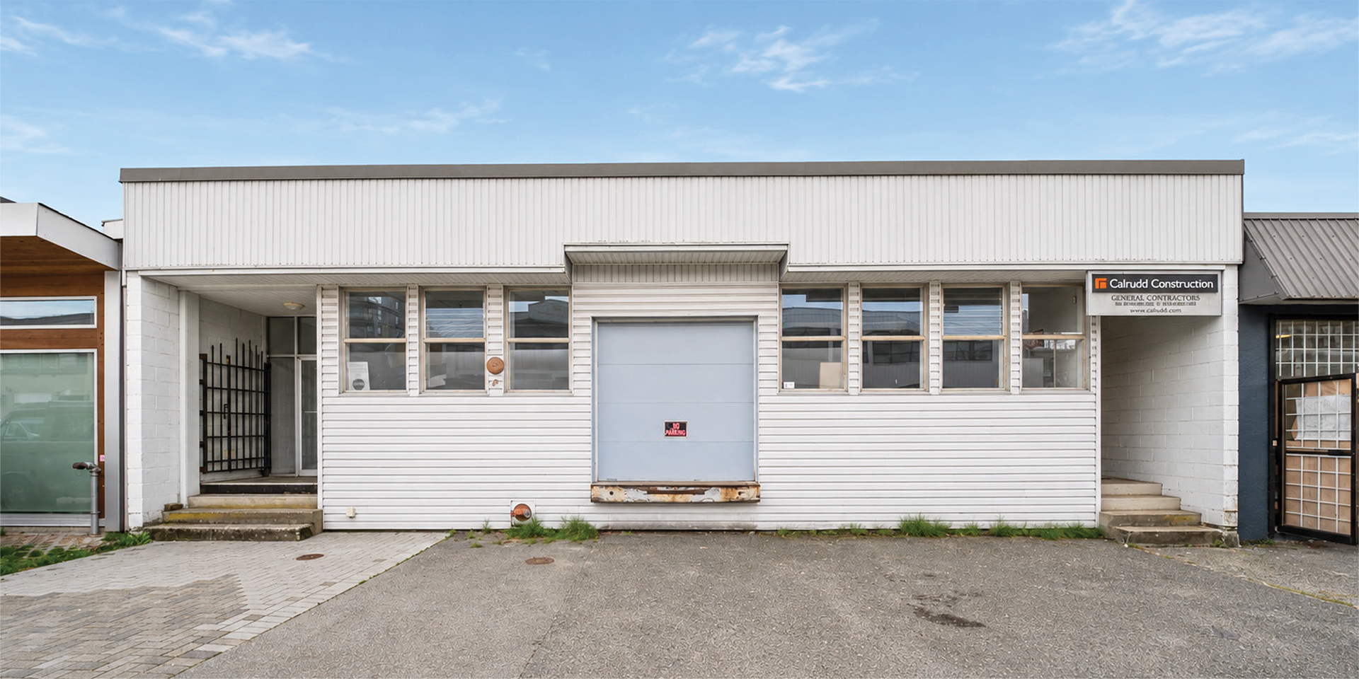 247 East 1st Street building exterior main entrance and loading door