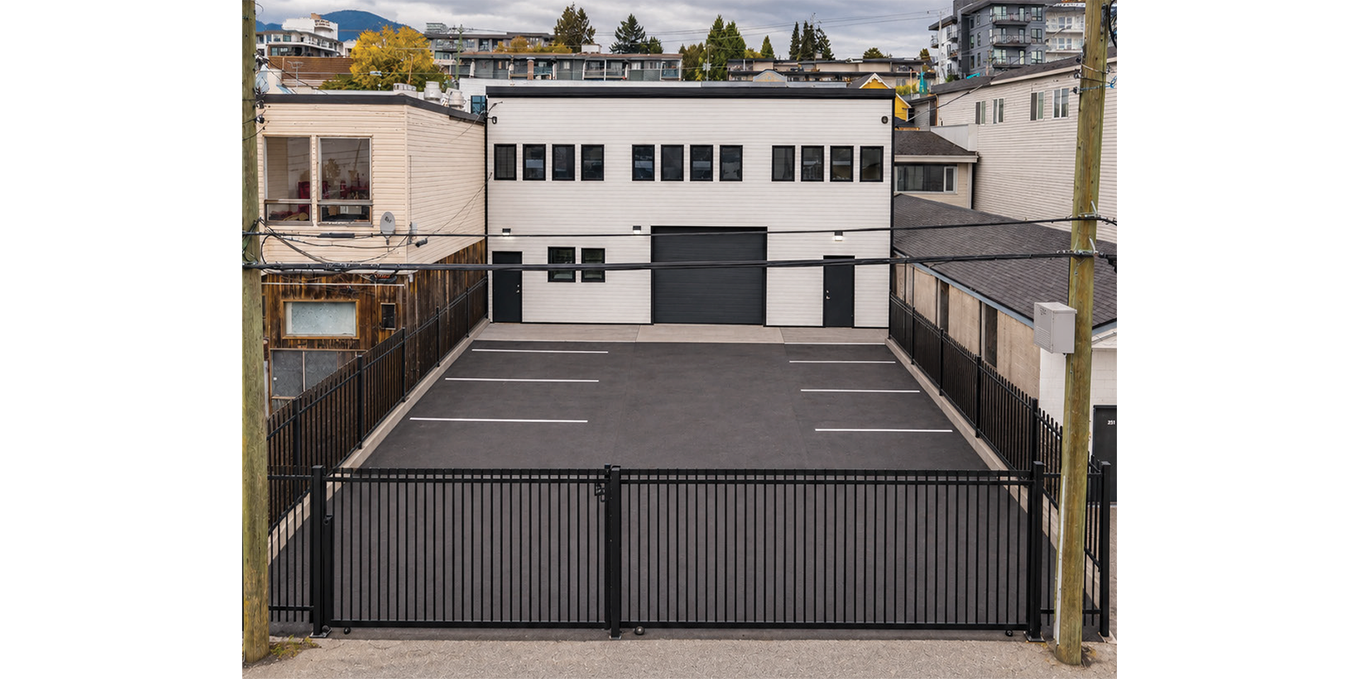 247 East 1st Street building exterior rear entrance and parking