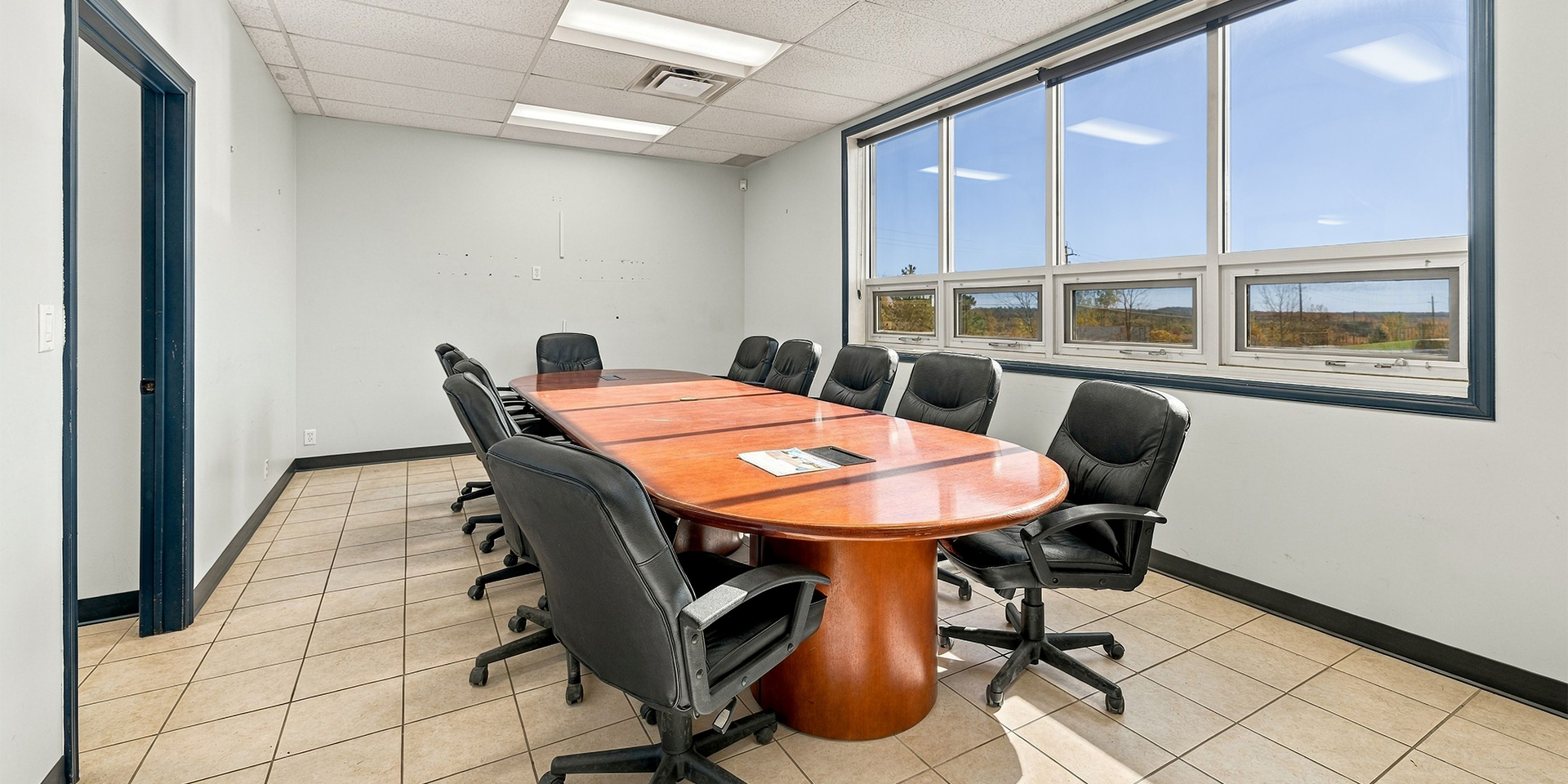 306-310 Darrell Drive meeting room with large windows