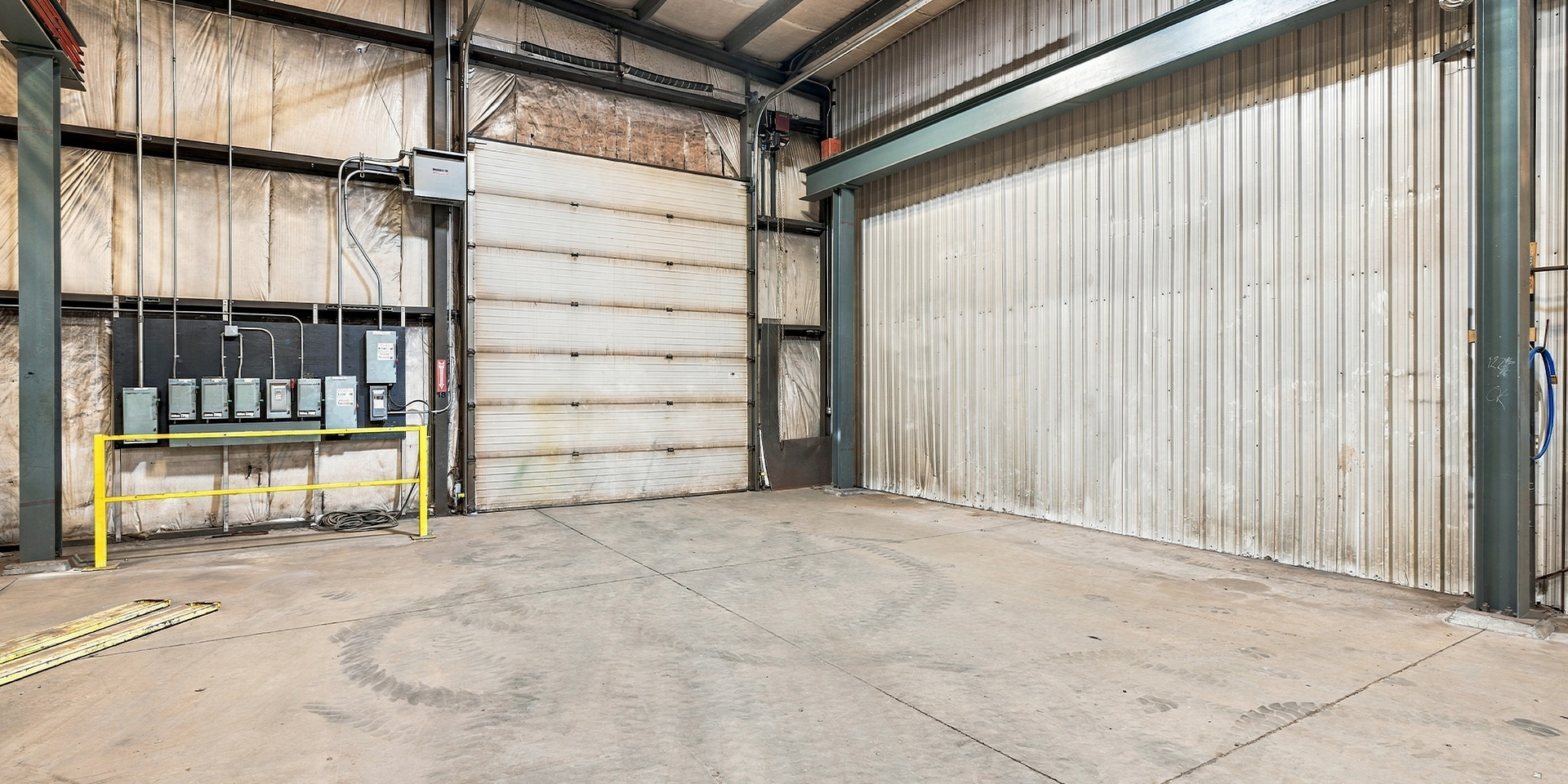 306-310 Darrell Drive interior warehouse area with shipping door