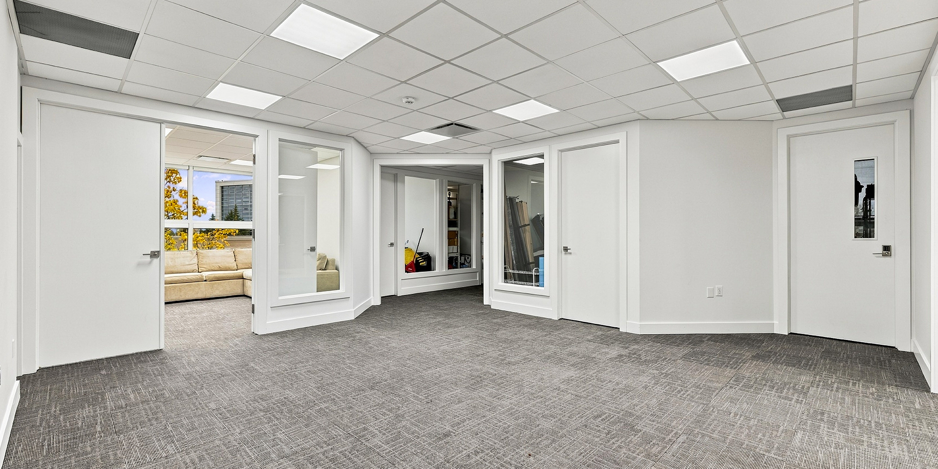 5347 John Lucas Drive hallway empty room with three doors leading to other office