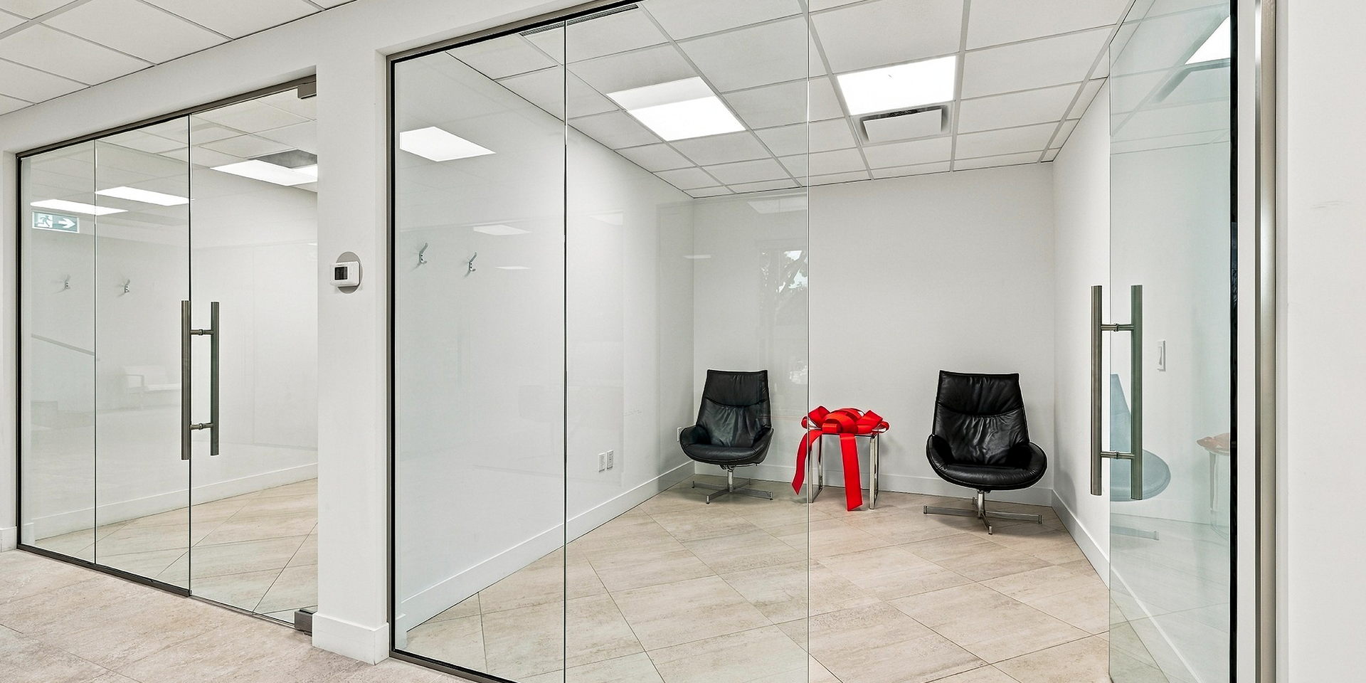 5347 John Lucas Drive hallway office with that has two black chairs