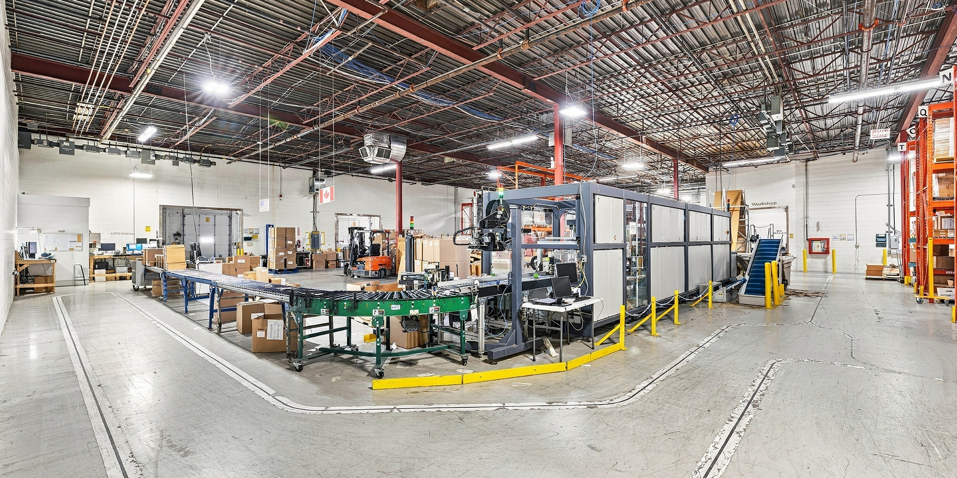 6400 Northwest Drive warehouse fulfillment showing conveyor belt
