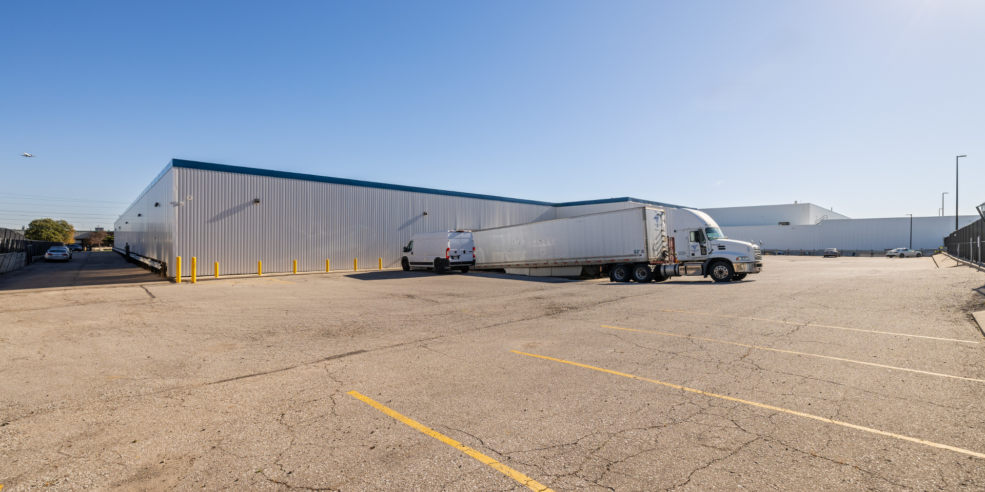 6400 Northwest Drive rear building exterior showing parking lots