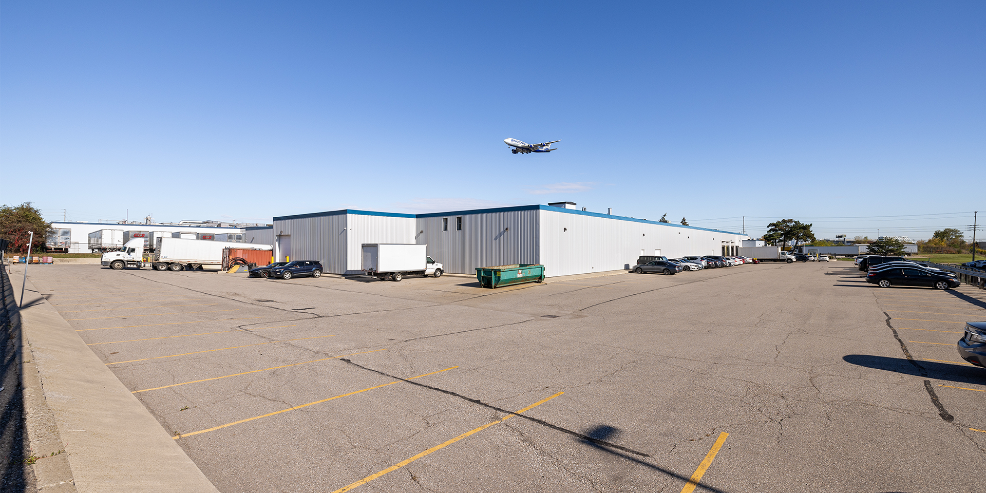 6400 Northwest Drive rear building exterior showing parking lots another angle