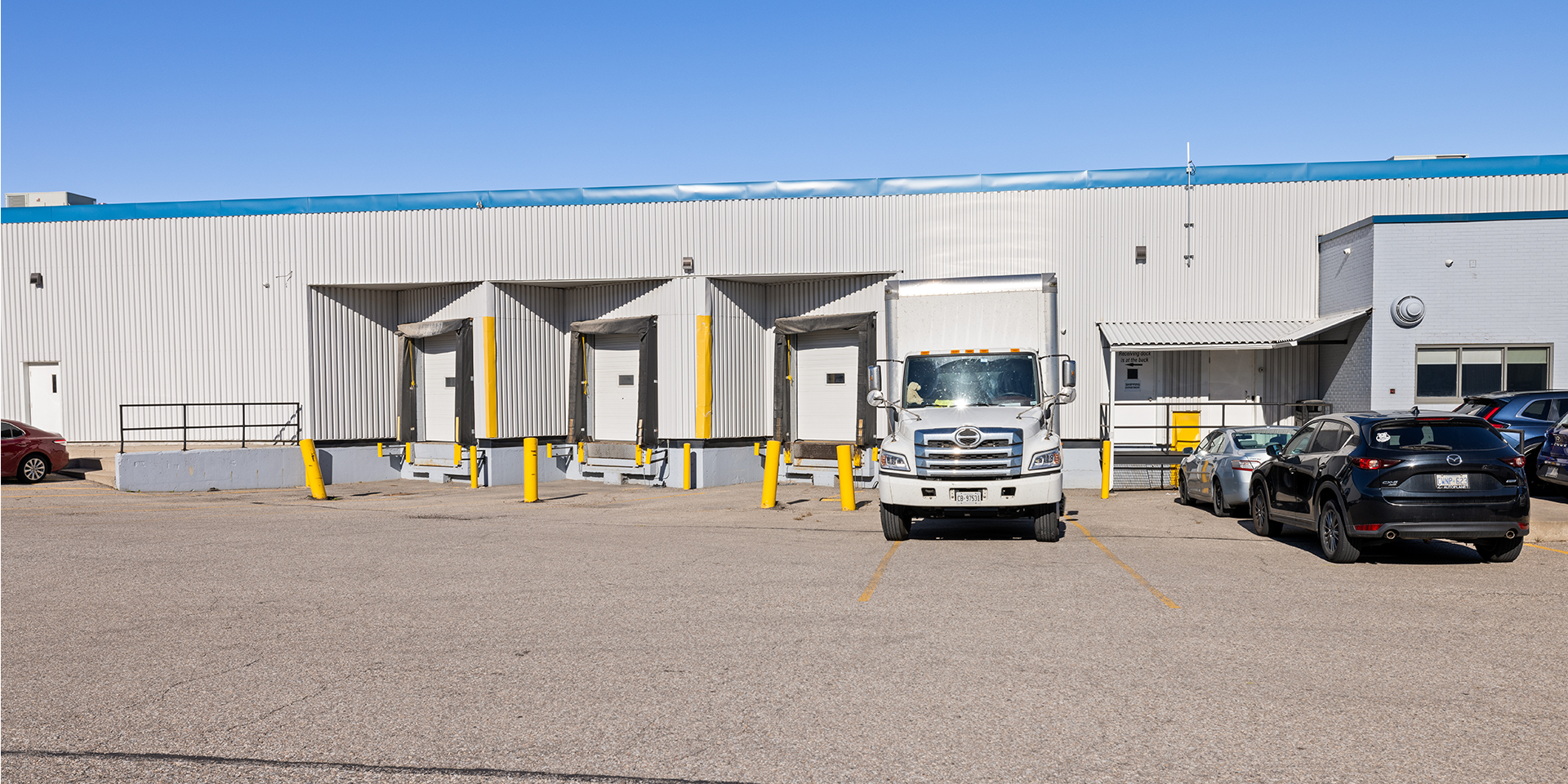 6400 Northwest Drive rear building exterior showing TL shipping doors