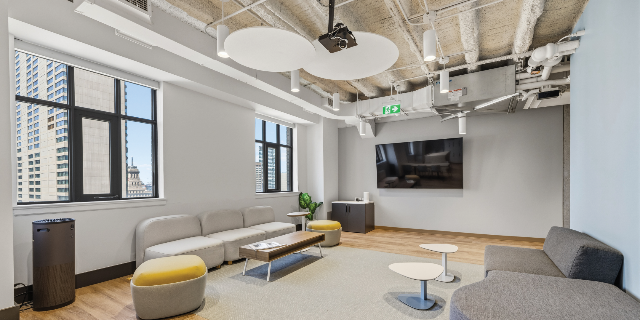 80 Richmond St W office with Sofa and TV