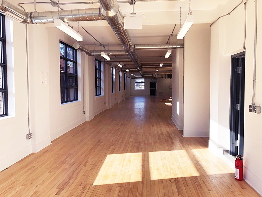 204 Spadina Ave empty office space with big windows