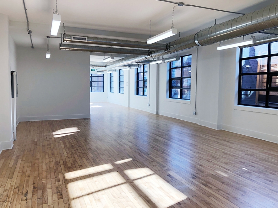 204 Spadina Ave empty office space with windows and lights