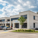 2585-2595 Skymark Ave Building with view of the front parking