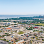 aerial of Stoney Creek with vacant land parcel at 282 Centennial Pkwy N highlighted in white