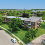 88 Confederation Drive building exterior with lots of greens