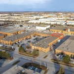 Aerial of Red Brick Industrial Complex with unit available highlighted in orange