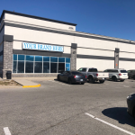 2036 Ellesmere Road Building with Mock-Up Signage