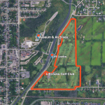 aerial of golf course with property line outlined in orange