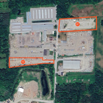 Google Earth Aerial with two land sites outlined in Orange