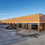375 Admiral Boulevard building exterior showing main entrance and parking