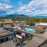 Aerial View of 1490 Columbia Street, including the industrial yard and showing the view of Vancouver