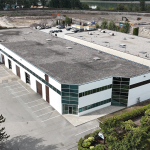 10167 199B Street aerial showing main entrance and parking